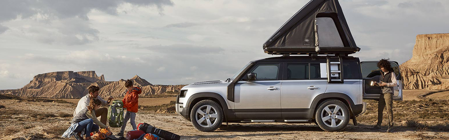 2024 Defender vs Ford Bronco silver sideview