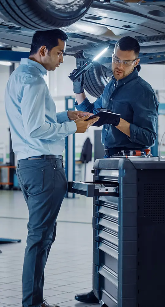 techs going over repairs at service center in Huntsville