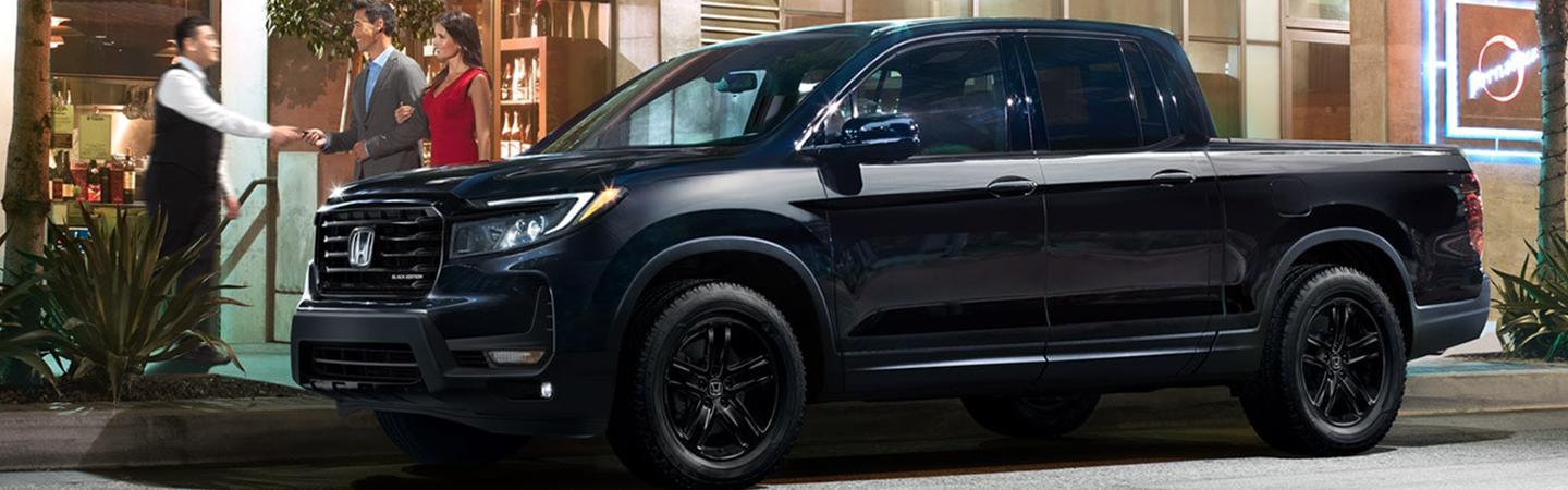 black 2022 Honda Ridgeline parked in city