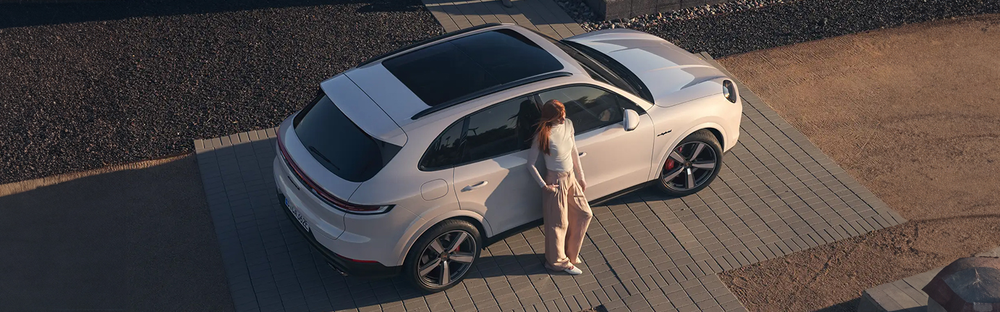 2024 Porsche Taycan vs 2024 Porsche Cayenne top view in white