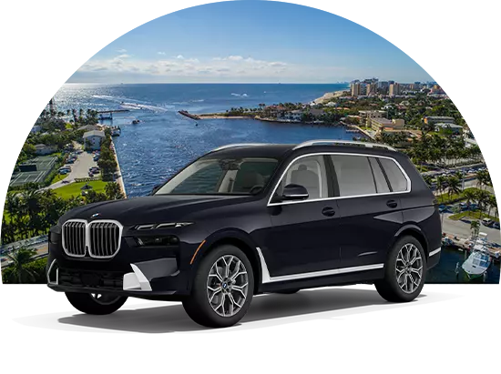 BMW SUV parked in front of landscape