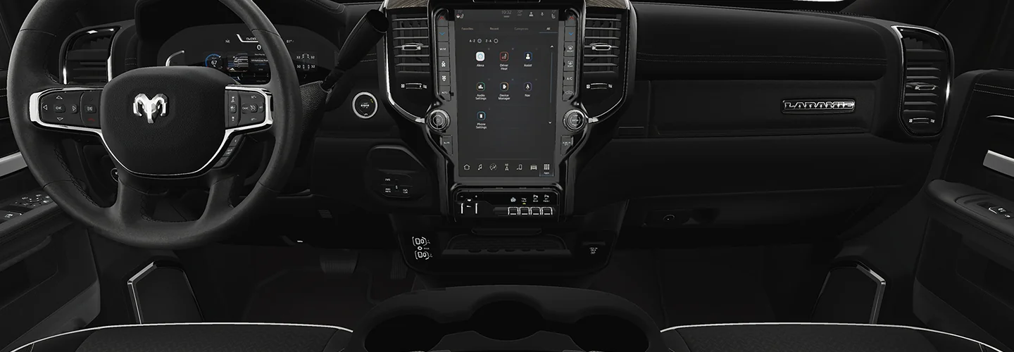Interior view the dashbaord and tech of a 2026 RAM 3500