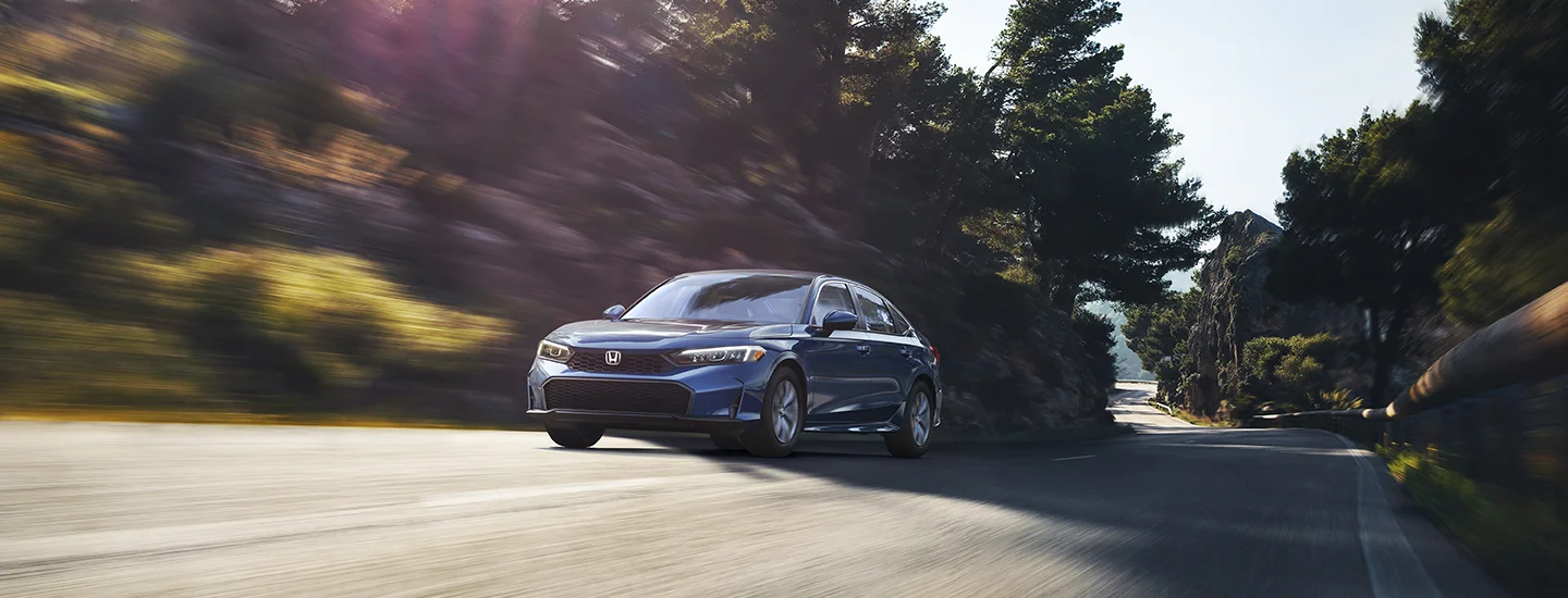 front view of a light blue 2026 Honda Civic Hybrid Sedan