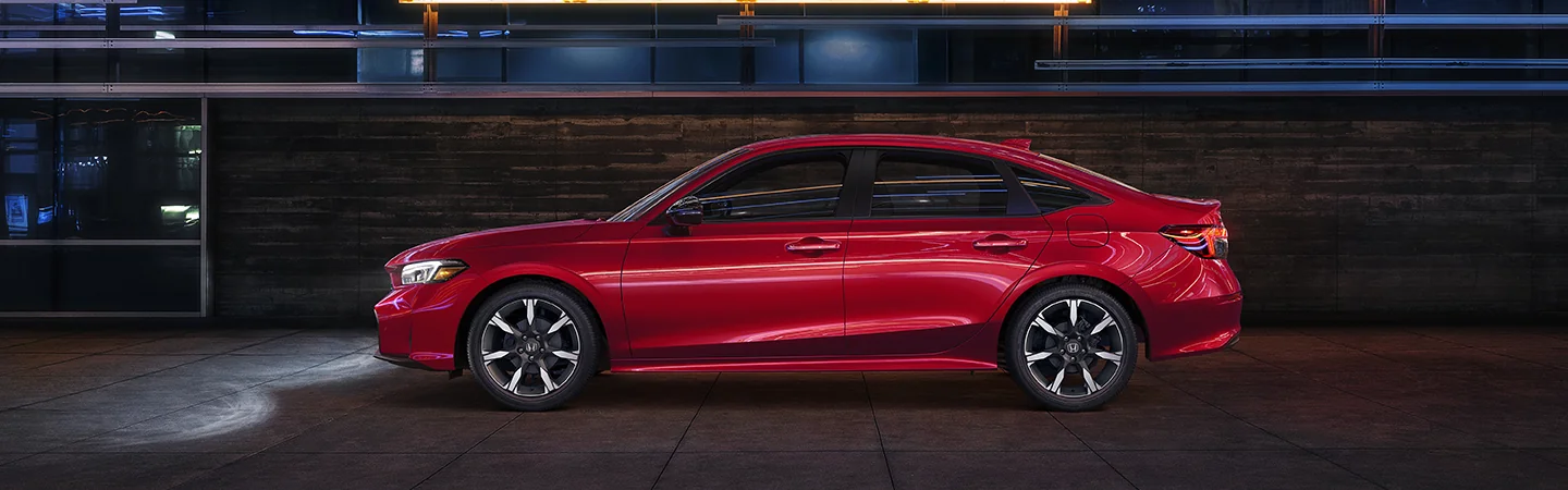 side view of a red 2026 Honda Civic Sport Hybrid
