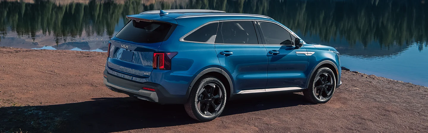 2025 Kia Sorento Hybrid parked by a lake