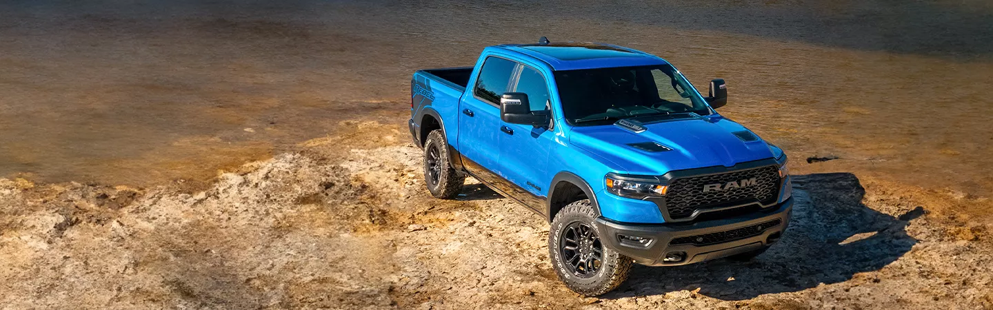 2026 RAM 1500 parked on muddy dirt road