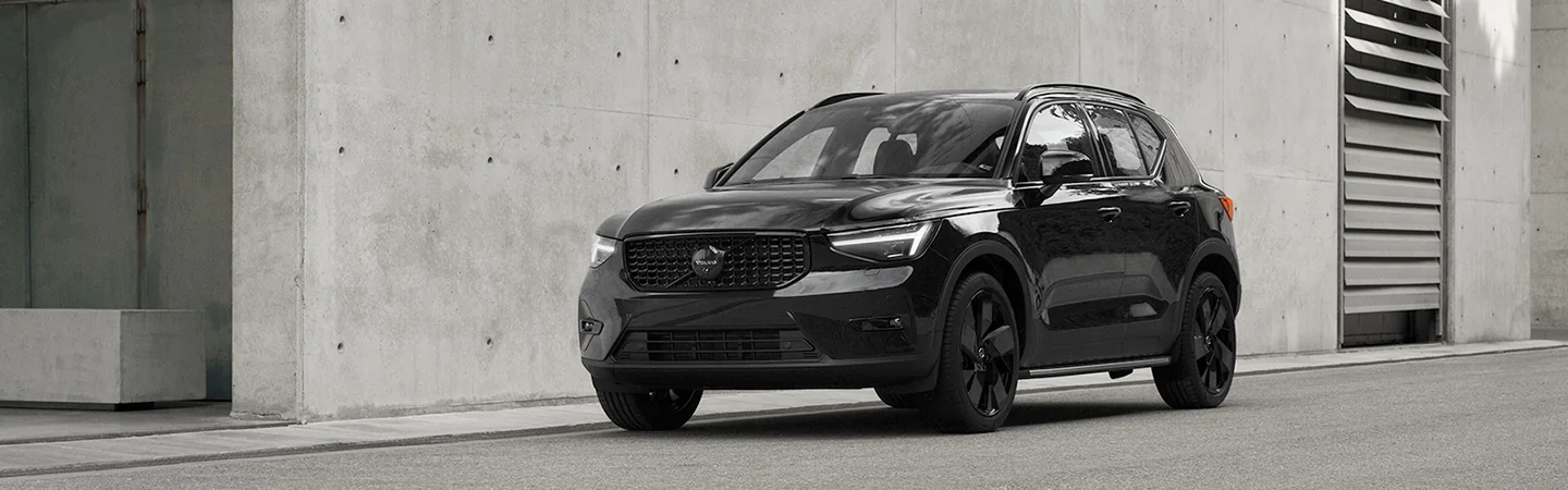 A black 2025 Volvo XC40 parked on the street