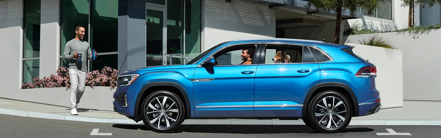2025 Volkswagen Atlas Cross Sport blue side view