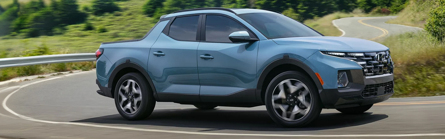 2024 Hyundai Santa Cruz vs Ford Maverick blue color sideview