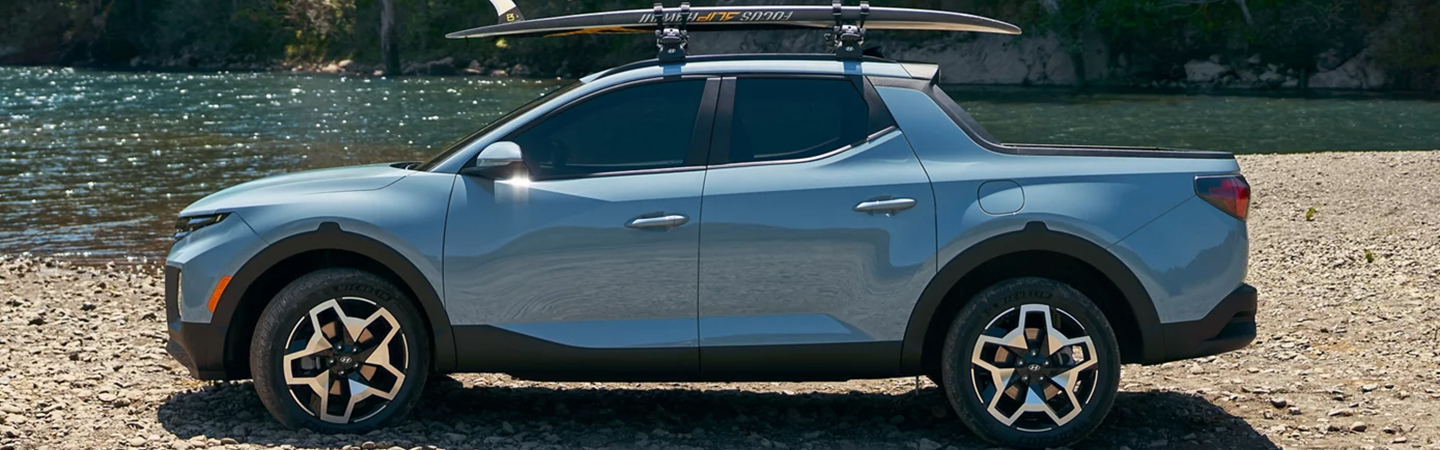 2024 Hyundai Santa Cruz vs Ford Maverick blue color sideview