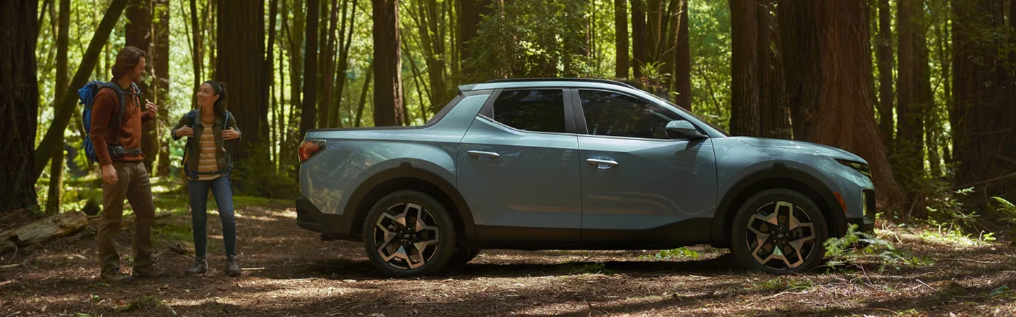 2024 Hyundai Santa Cruz vs Ford Maverick silver color sideview