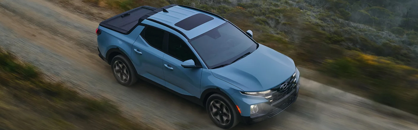 2024 Hyundai Santa Cruz vs Ford Maverick blue color topview