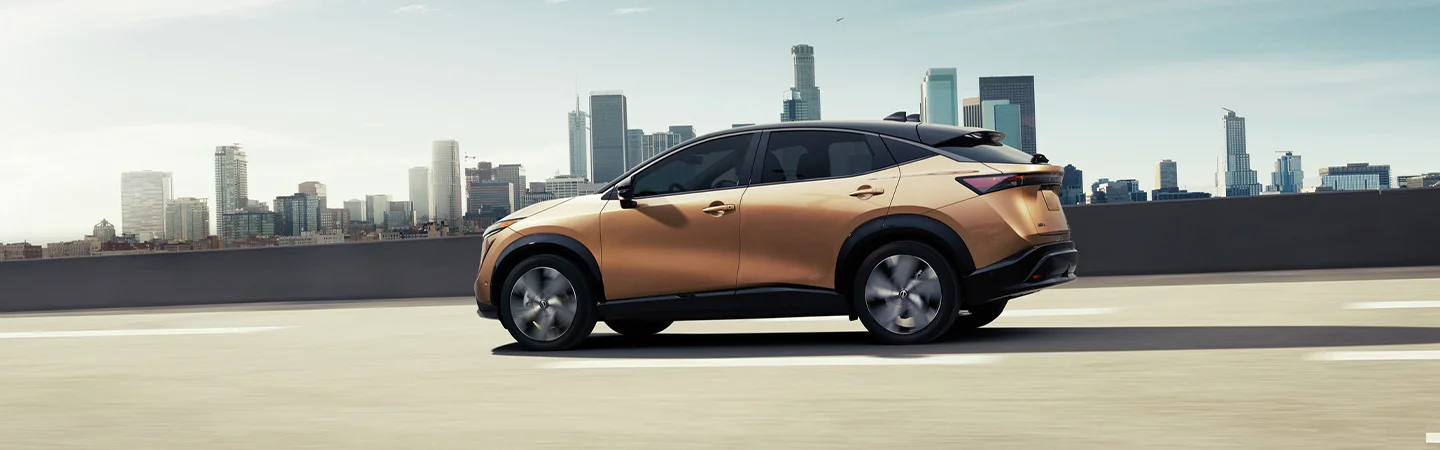 2024 Nissan ARIYA Specs color gold and side view