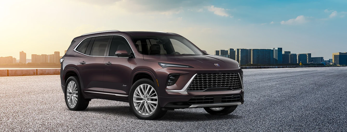 front view of a parked 2026 Buick Enclave at sunset