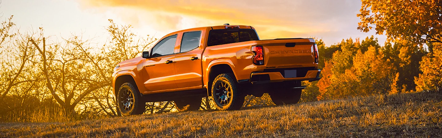 rear view of an orange 2026 Chevrolet Colorado WT offroad