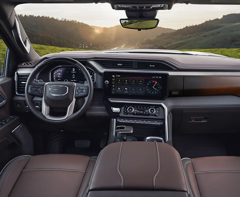 Interior view of the front seat and dashboard of a 2026 GMC Sierra 1500
