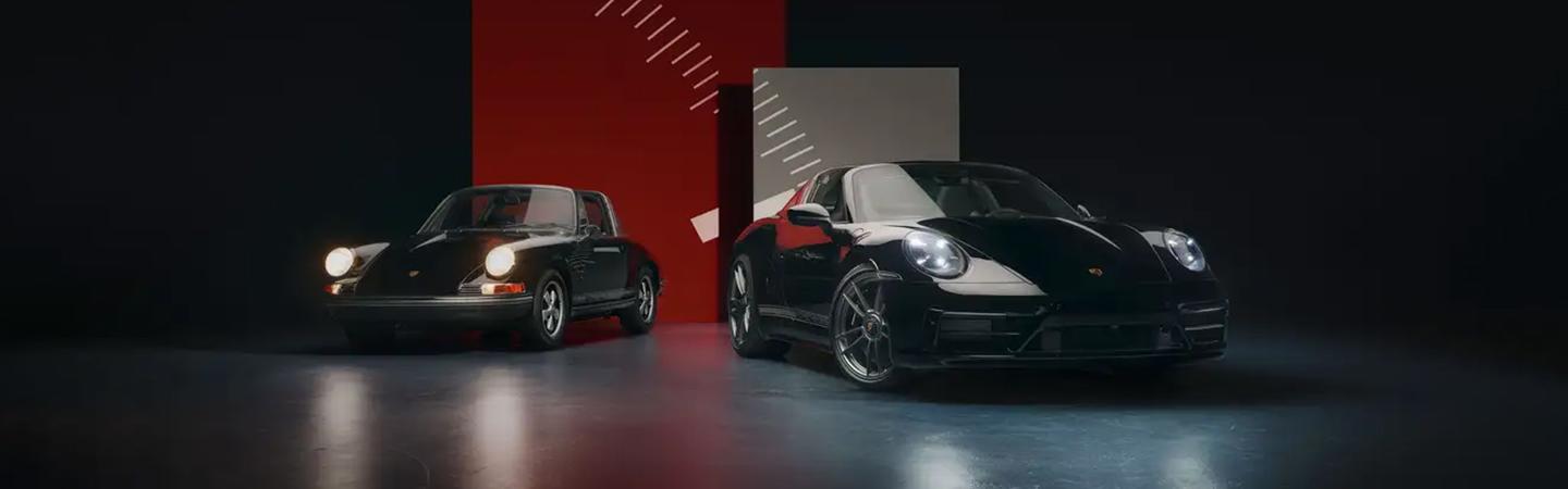 2 2022 Porsche 911 GT3 parekd side by side in a showroom