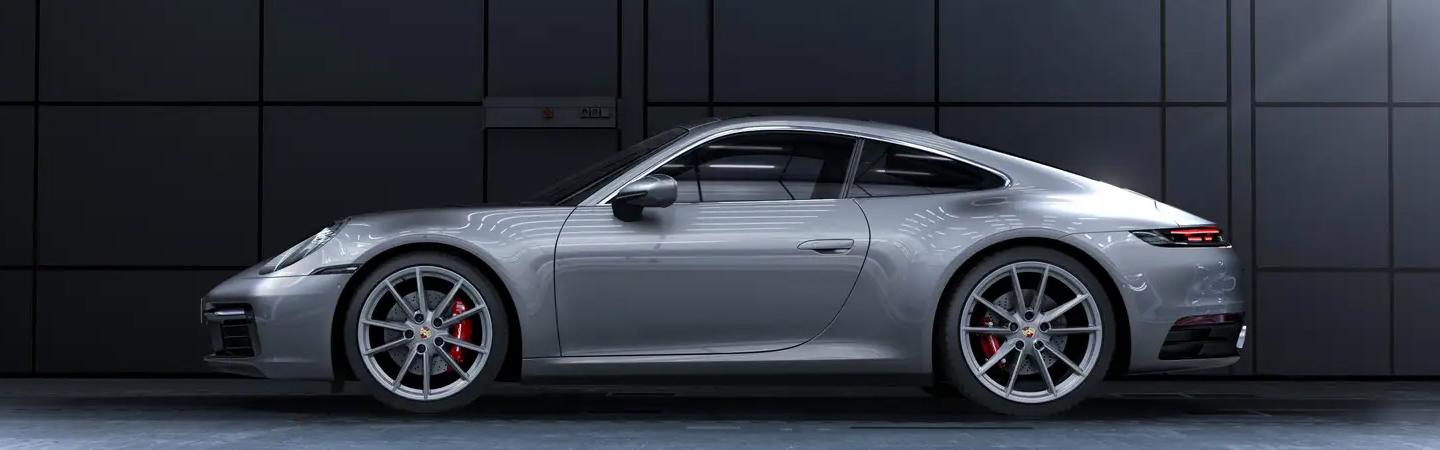 Side view of a gray 2022 Porsche 911 GT3 parked