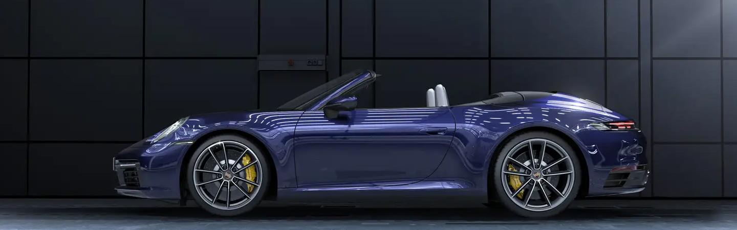 A Blue convertible 2022 Porsche 911 GT3 parked