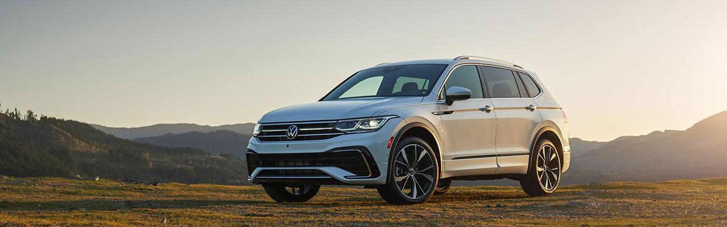 Gray 2022 Volkswagen Tiguan parked on grass