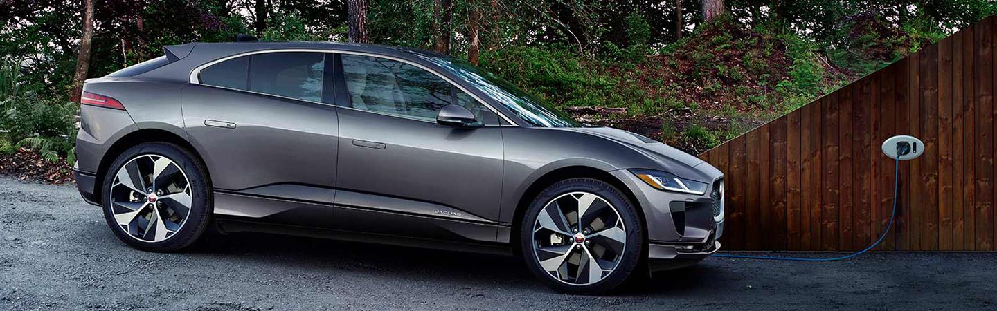 A 2022 Jaguar I-PACE parked at home charging