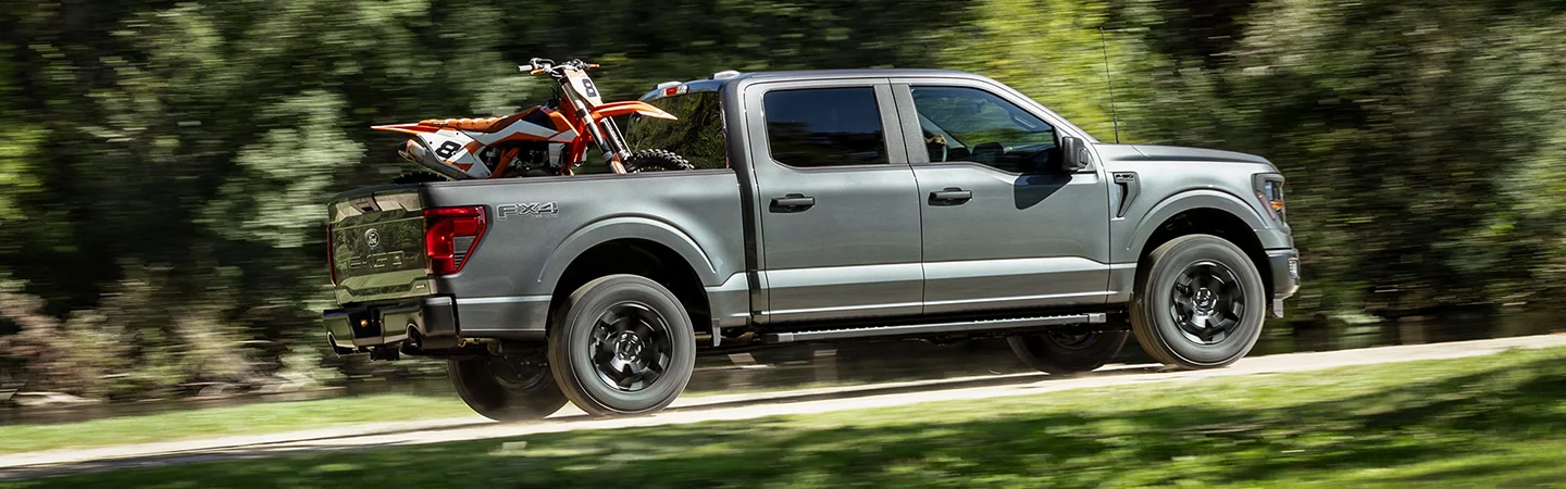 2025 Ford F-150 XL with motorcycle in back