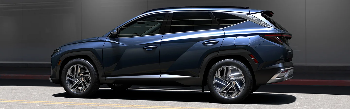 driver side view of a 2025 Hyundai Tucson SE