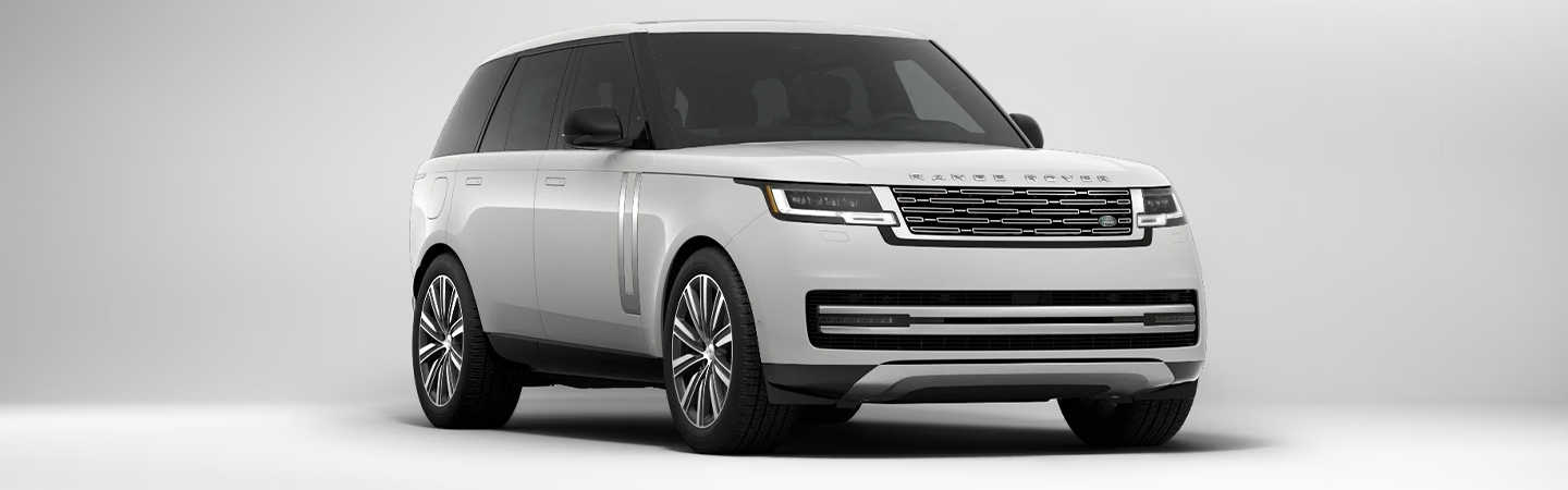 2024 Range Rover vs 2024 BMW X7 front side in white 