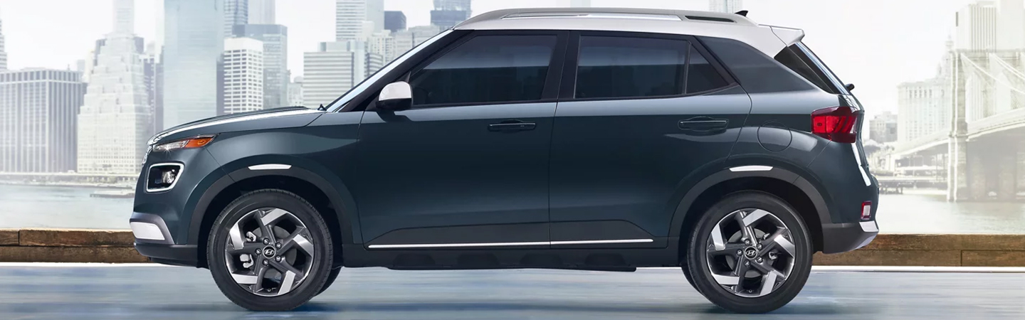 Comparison: 2024 Kia Soul vs. Hyundai Venue black color side view