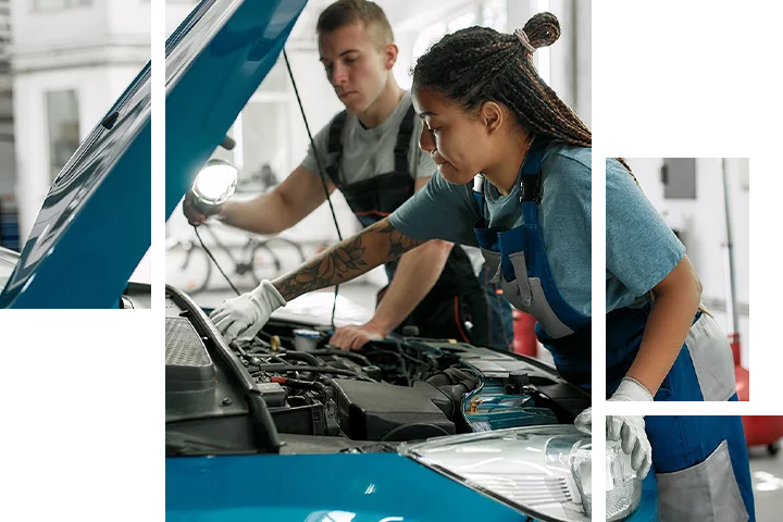 2 mechanics working under the hood