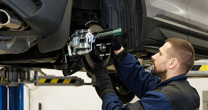 tech checking car