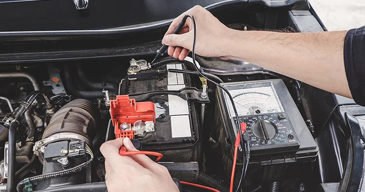 tech checking car