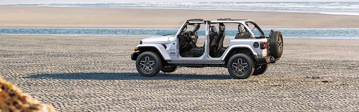 2026 Jeep Wrangler parked on a beach