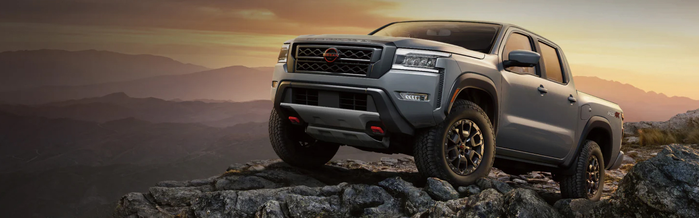 Nissan Frontier vs Nissan Pathfinder silver color frontview