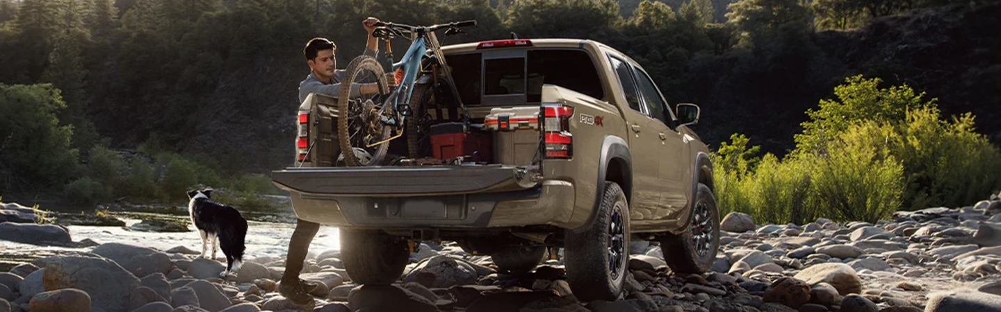 Nissan Frontier vs Nissan Pathfinder yellow color backview
