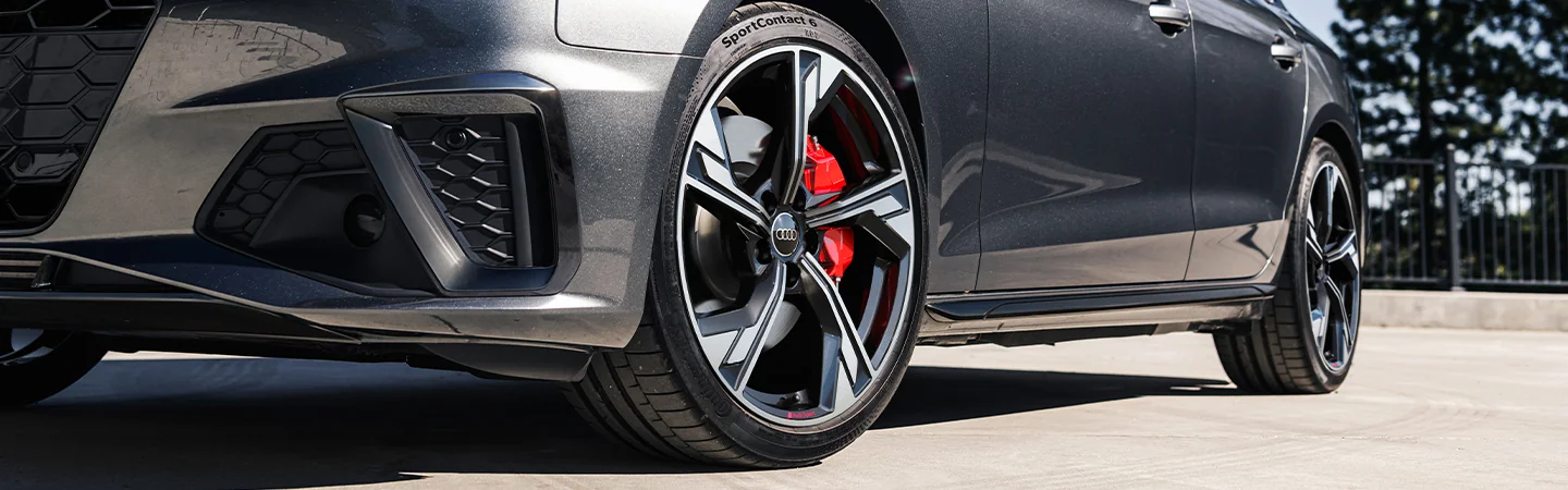 Close up of the side and tires on a gray 2025 Audi A4