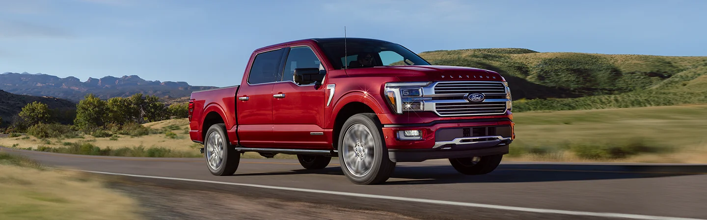 2025 Ford F-150 vs RAM 1500 redcolor sideview