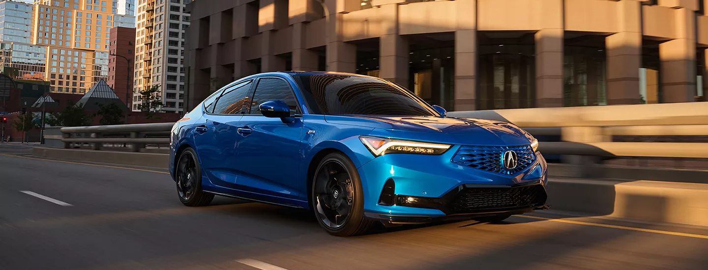 2026 Acura Integra driving through the city