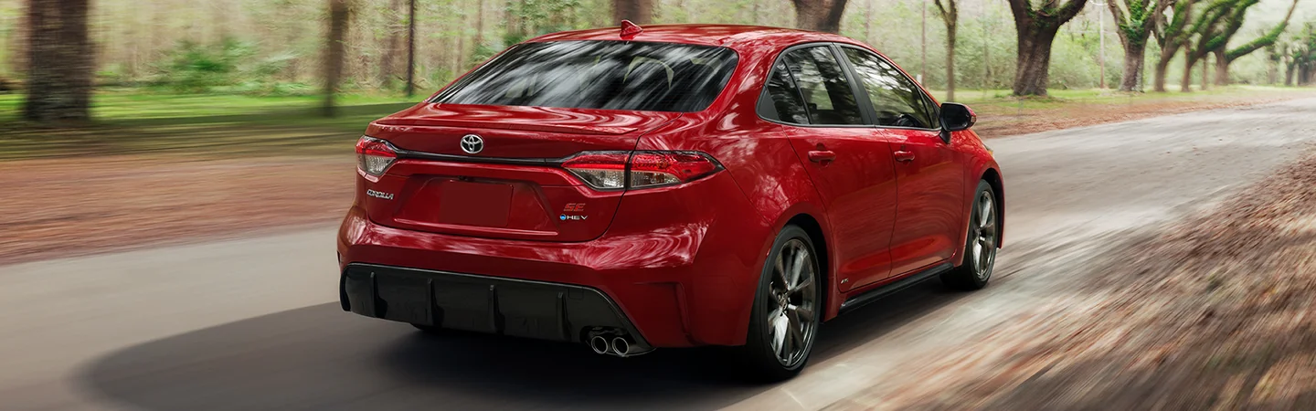 rear view of a 2026 Toyota Corolla on country road
