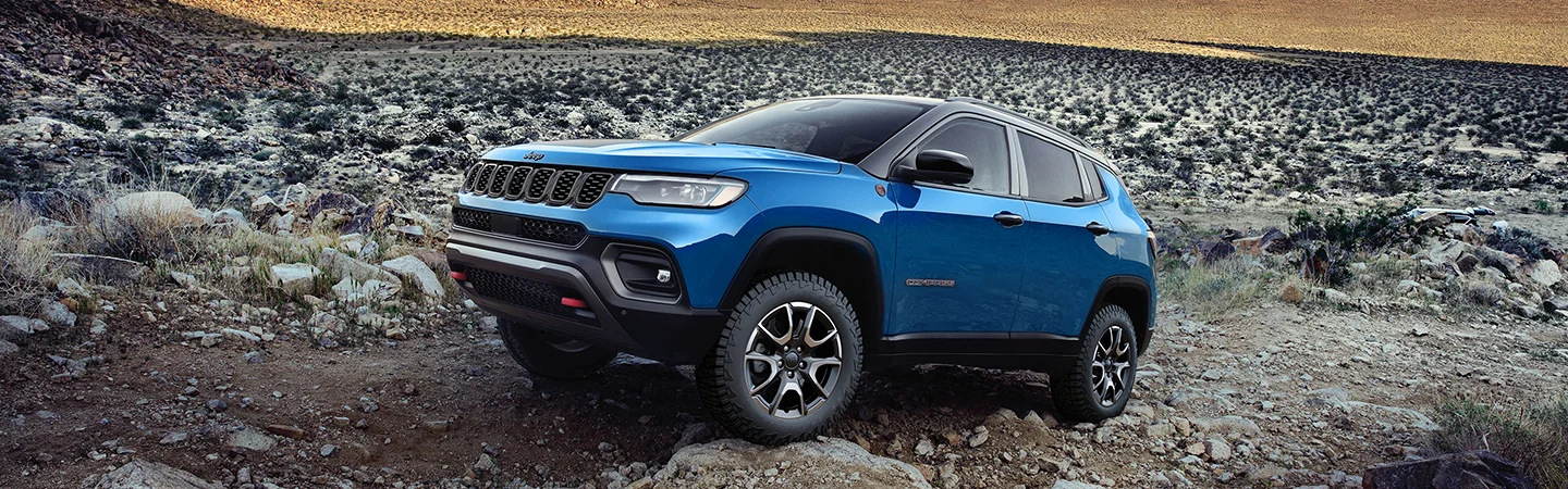 2026 Jeep Compass Limited climbing a hill of rock
