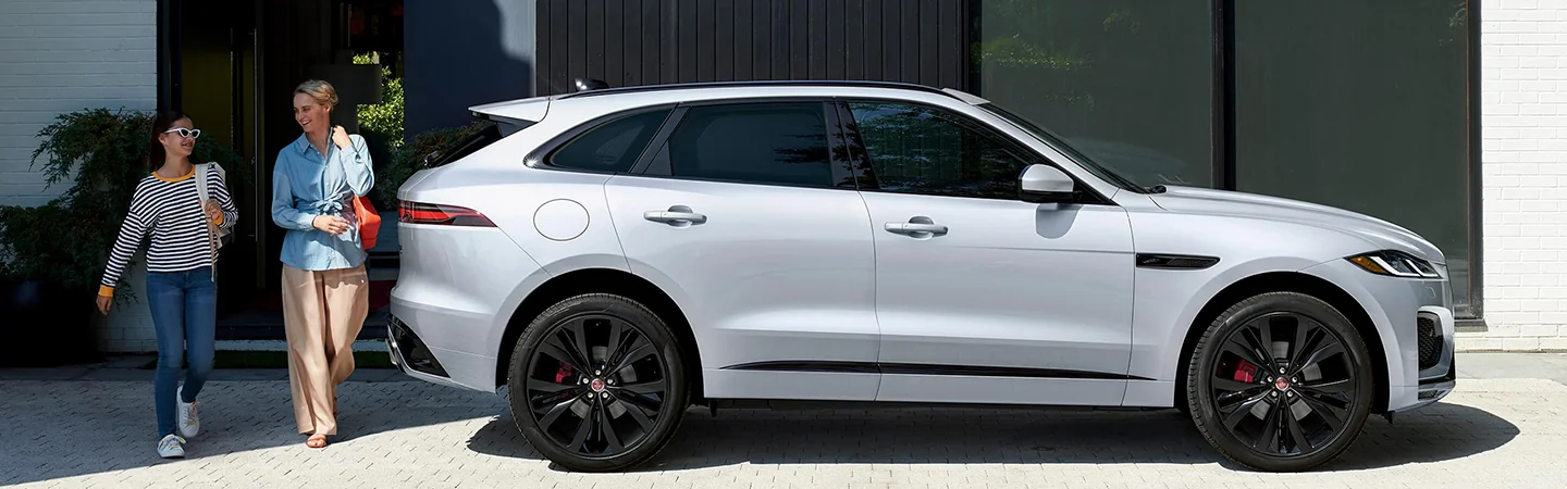 2024 Jaguar F-PACE Specs Side front in white
