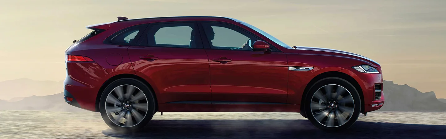2024 Jaguar F-PACE Specs side front in red