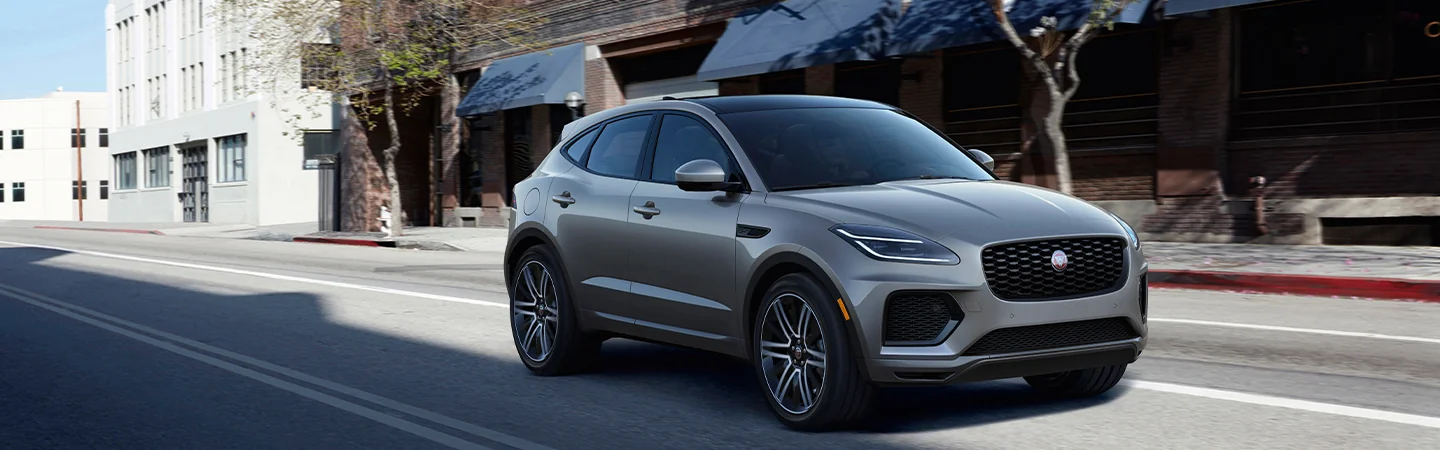 The 2025 Jaguar E-PACE grey Jaguar car running on road