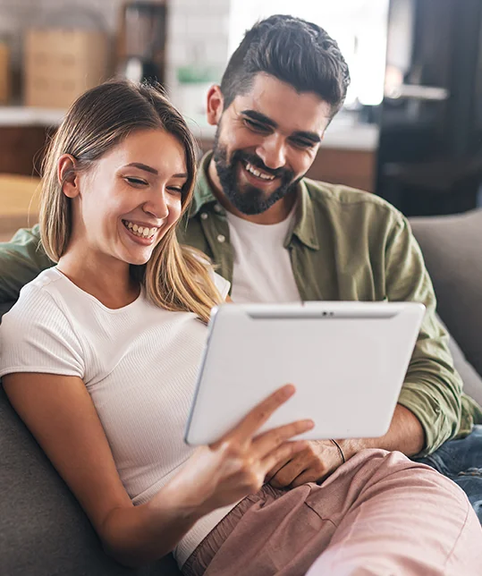 A couple going over car information