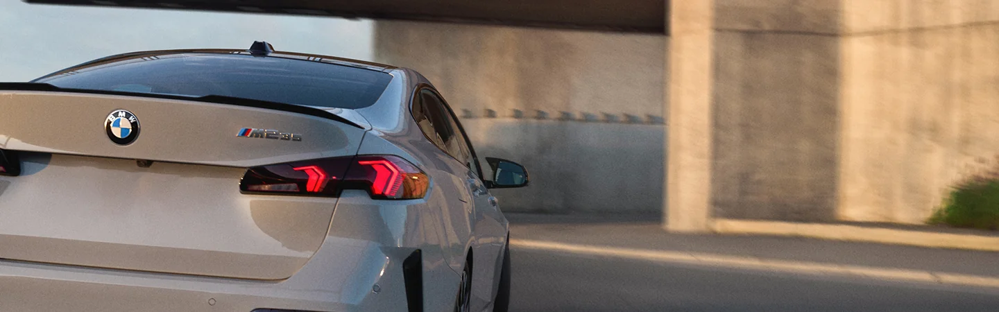 2025 BMW 2 Series white color car parked back view