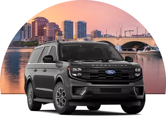 Ford SUV parked in front of cityscape