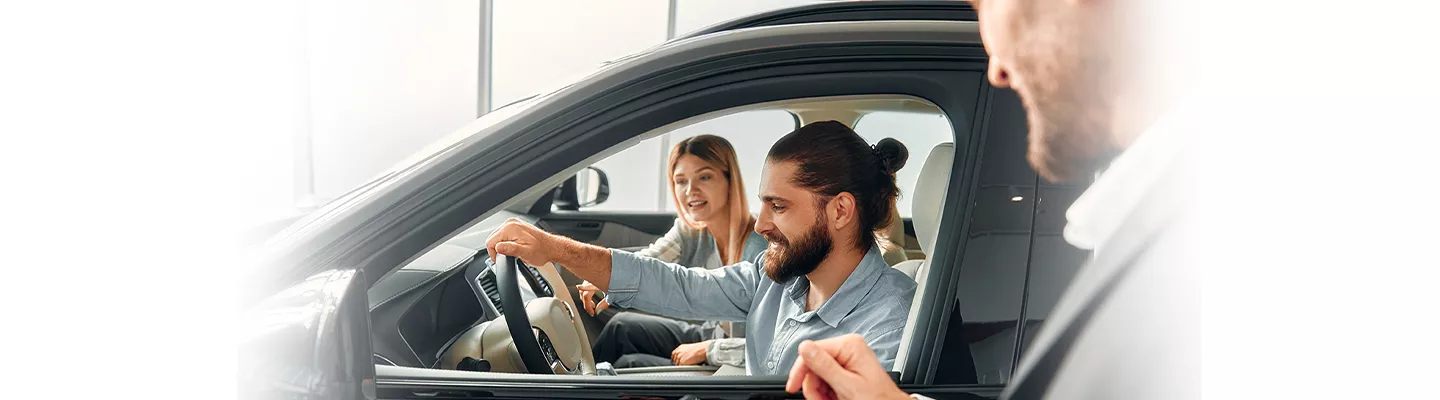 Customers test driving a new INFINITI