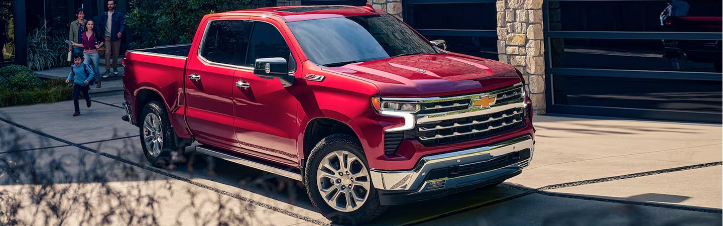 2024 RAM 1500 vs Chevrolet Silverado red color frontview