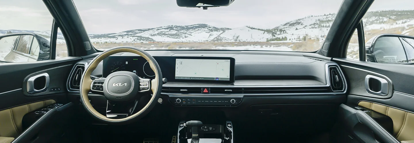 Interior view of the dashboard and tech of a2025 Kia