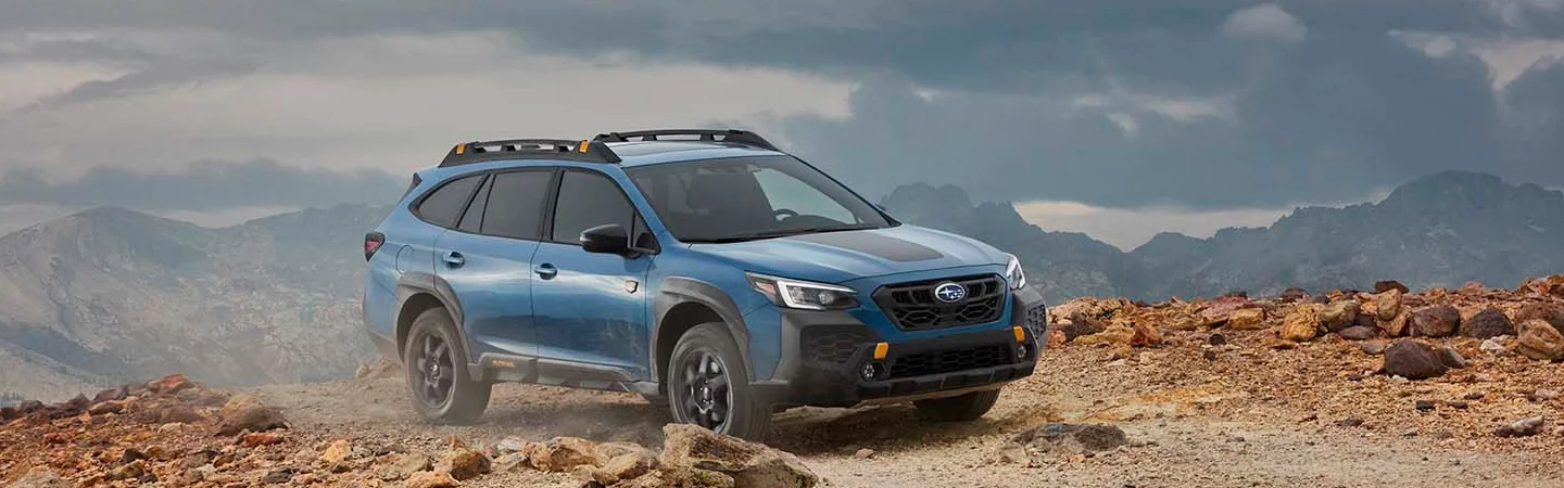 2025 Outback Wilderness vs Toyota RAV4 bluecolor frontview